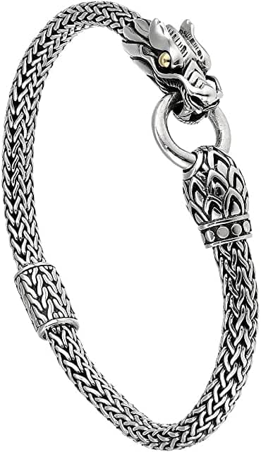 image: From our Legends Collection, the Naga was inspired by the mythical water dragon that protects the ocean's pearl. Wear facing inward to be bestowed with love and abundance, or outward for protection.